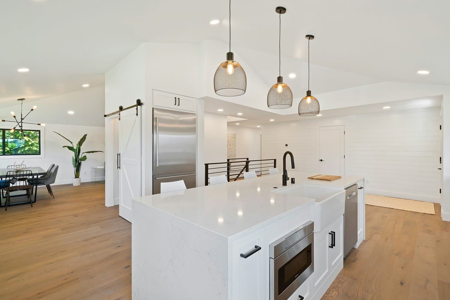 Newly built modern kitchen with granite countertops, representing local home services in Tampa such as painting, landscaping, paver installation, cleaning, granite installation, home remodeling, and air conditioning