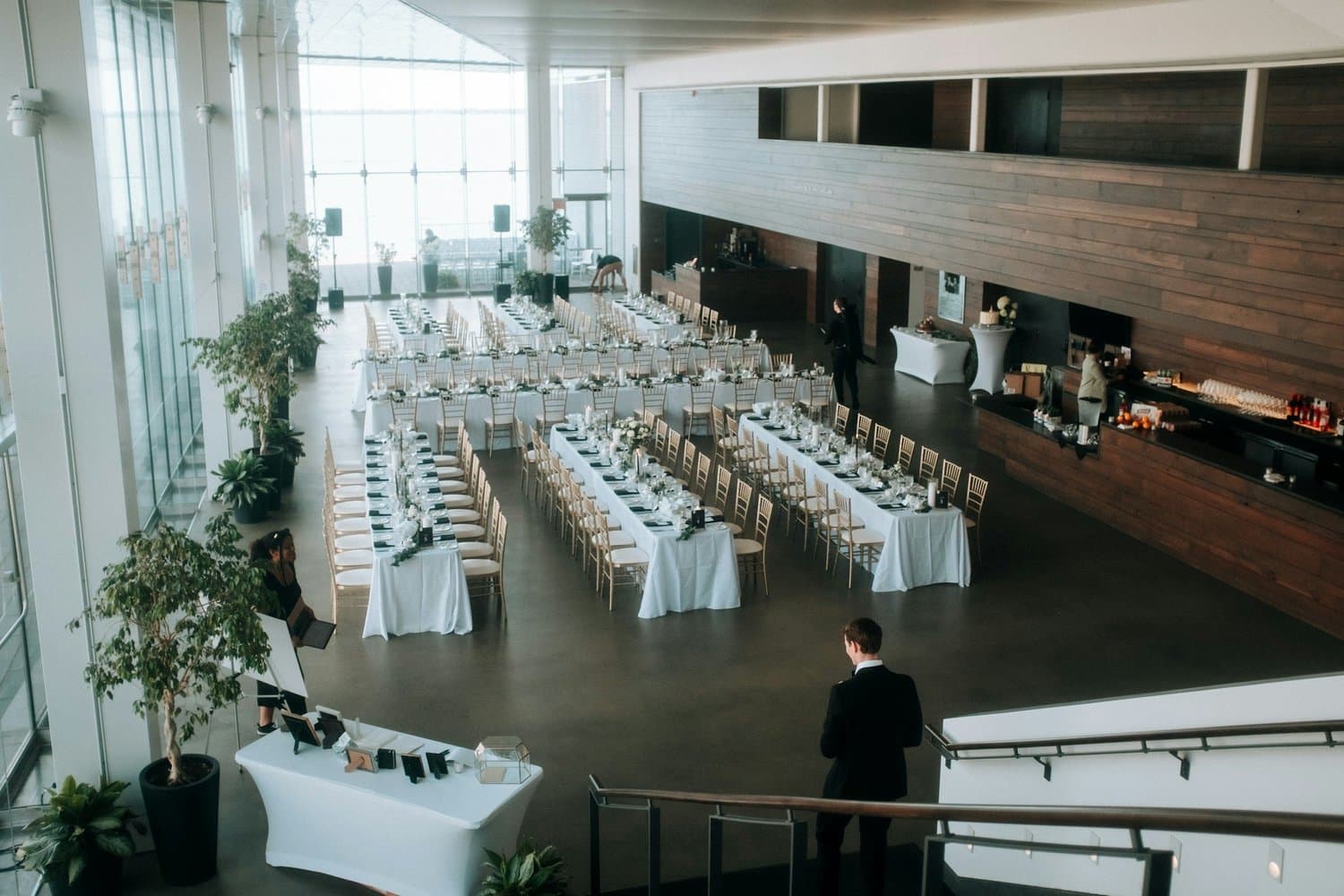 Elegant dinner event with catering and a guest speaker, showcasing local professional event services in Tampa including wedding planning, photography, and videography